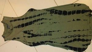 Green and black shirt with slits on each side